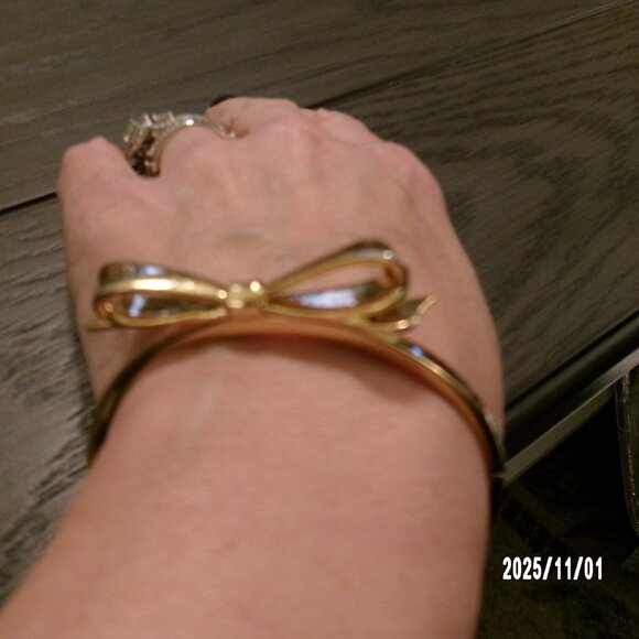 Kate Spade New York Post Gold-Tone Bow Hinged Bangle Bracelet - Picture 3 of 4